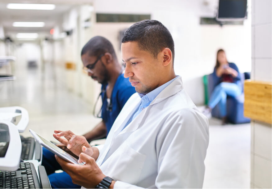 doctor at computer in hospital