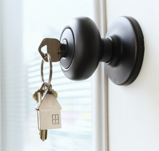 This is a picture of keys in a doorknob.