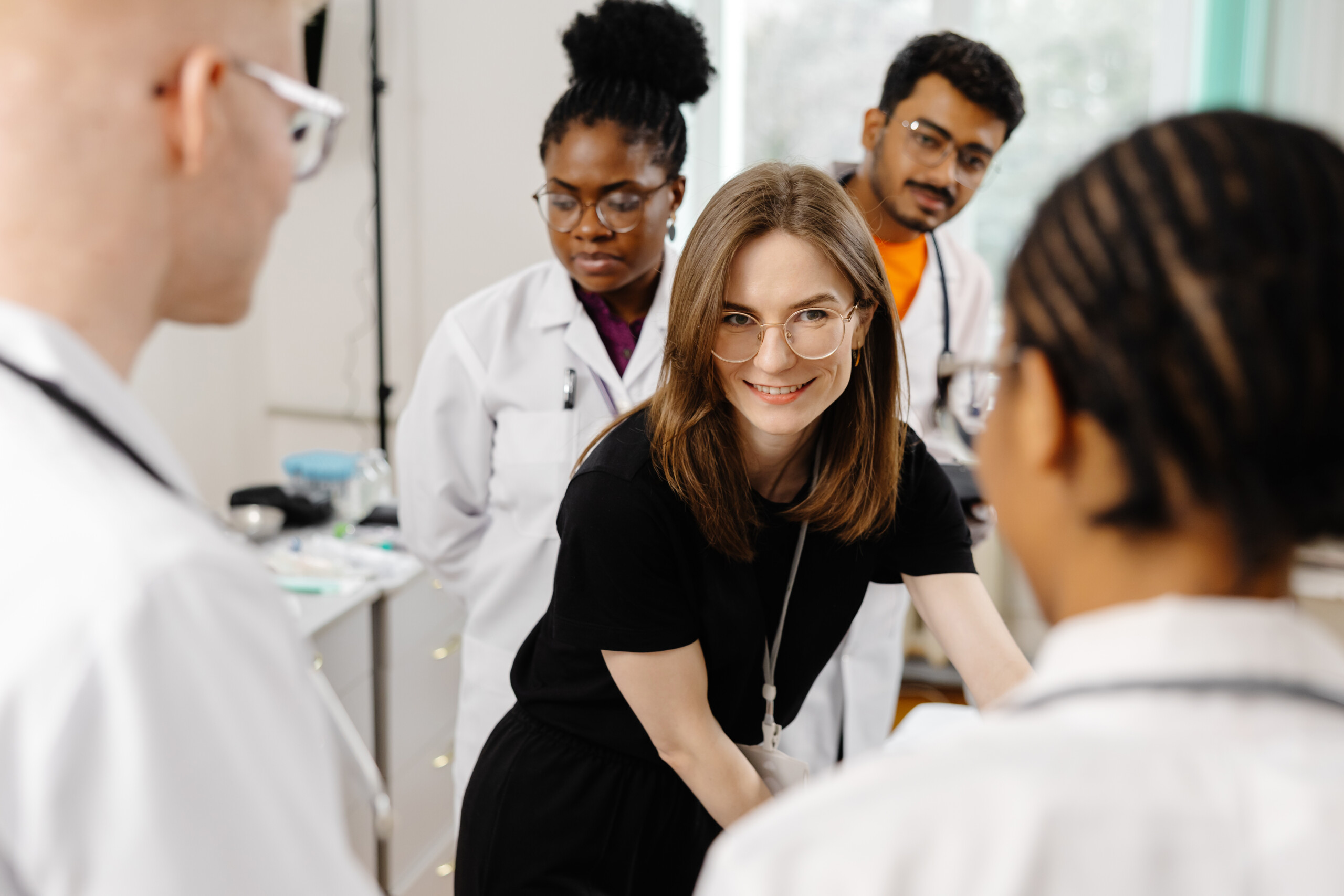 Transitioning from Residency to Practice | Female doctor smiling
