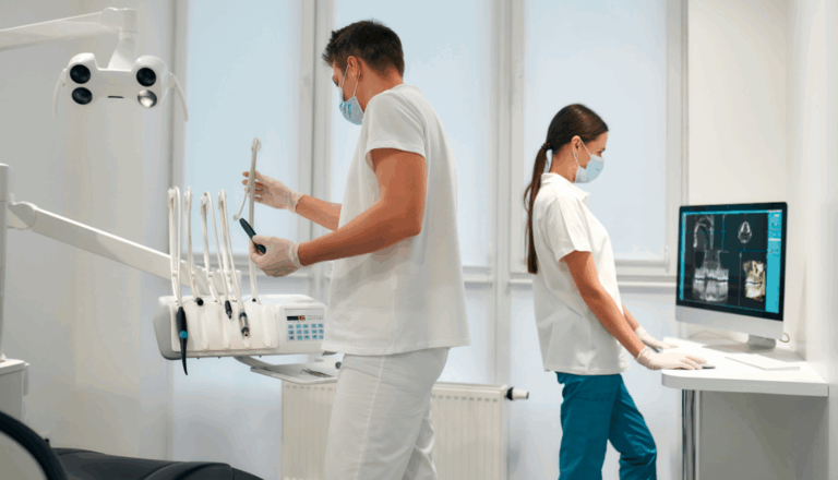 Two dental professionals in a dental office
