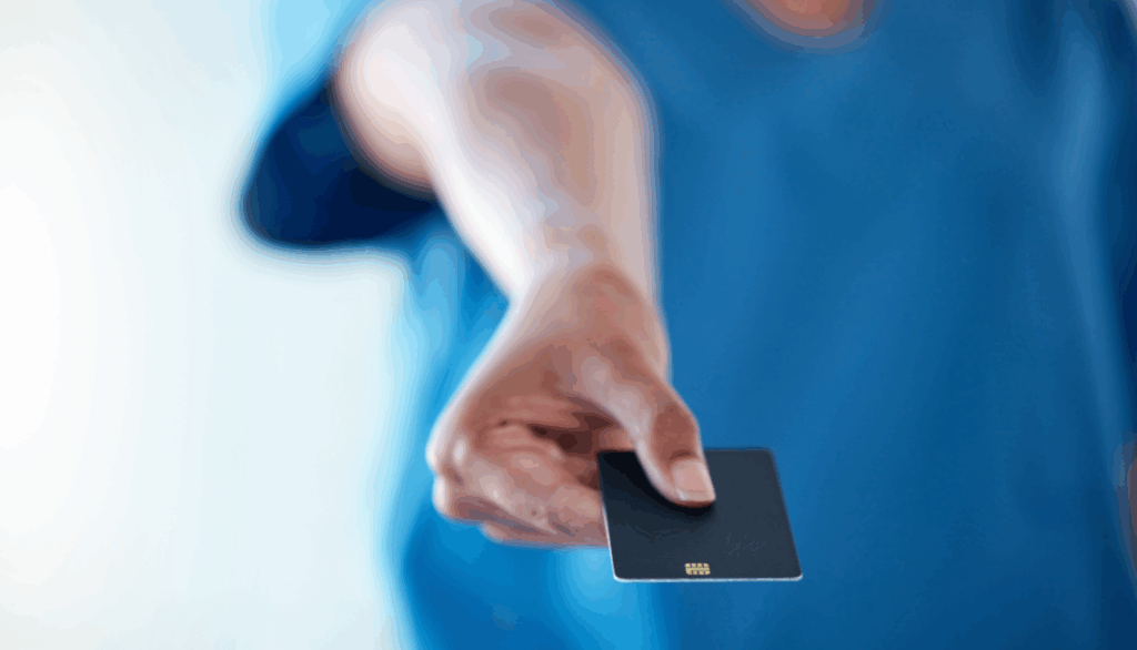 A person holding a credit card.