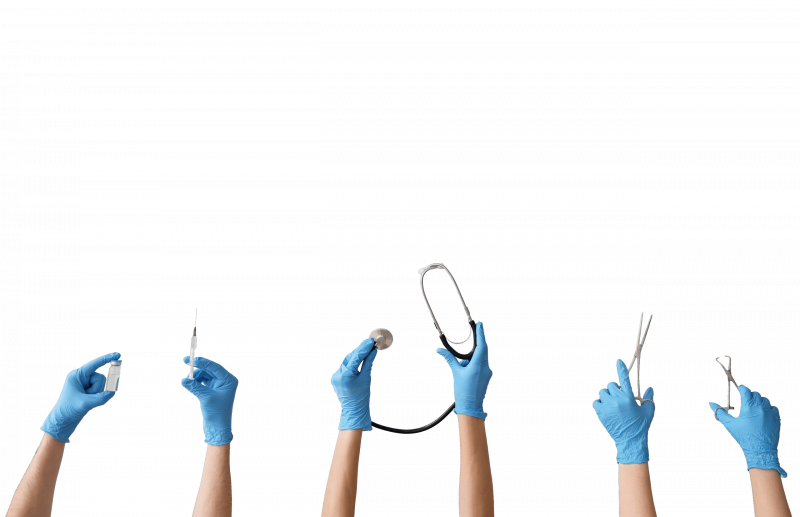 Hands holding medical tools and equipment